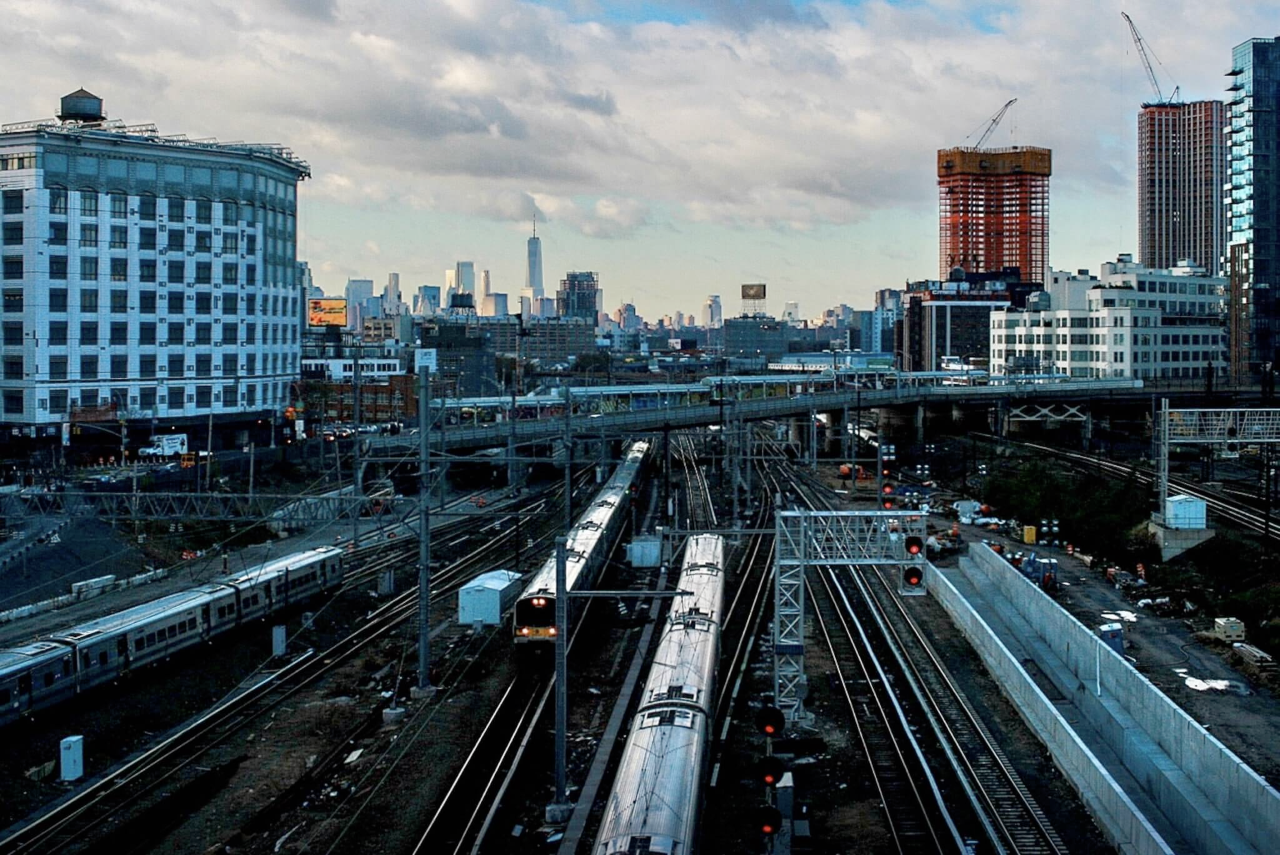 View of New York City overlooking train platform